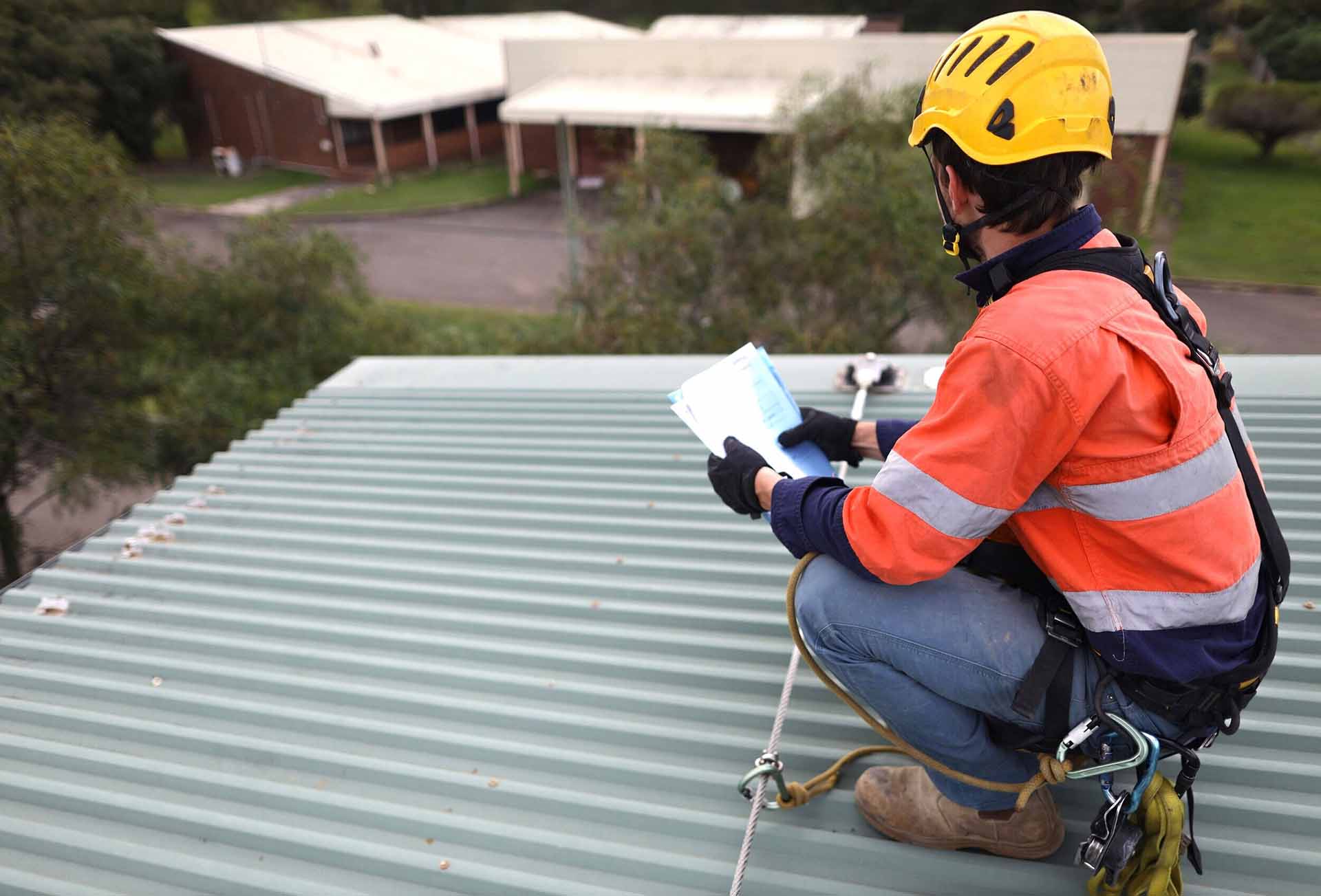 Professional roofer working